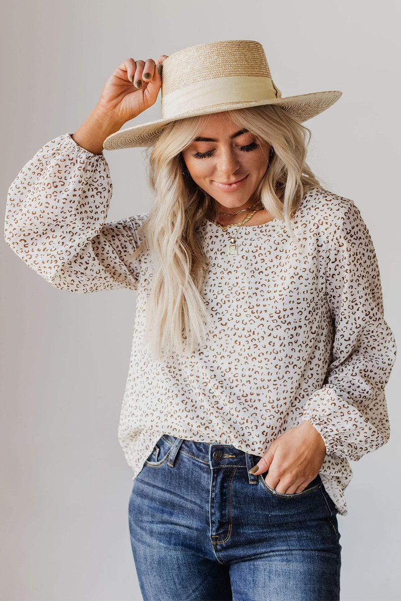 Blusa de manga larga con cuello redondo de leopardo