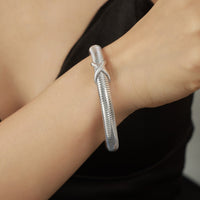 Pulsera en forma de resorte de acero inoxidable