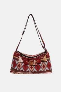 Bolso de hombro con correa ajustable y borlas