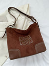 Bolso tote con correa ajustable de gamuza