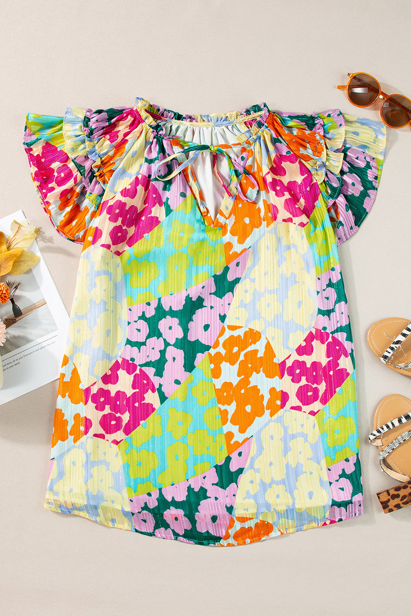 Ruffled Printed Tie Neck Cap Sleeve Blouse