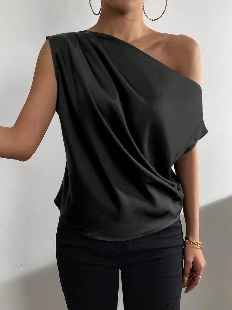 Blusa de un solo hombro con fruncidos