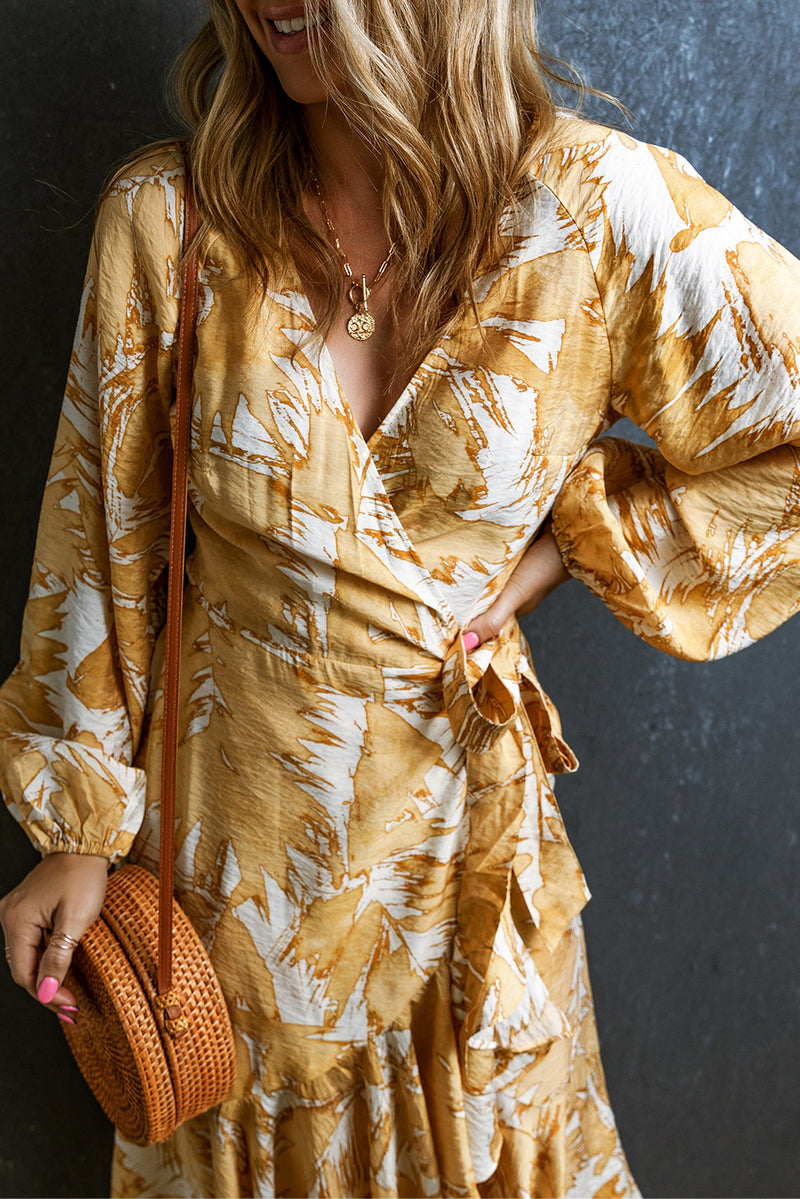 Vestido floral amarillo con cuello en V cruzado y cordones con mangas de burbujas