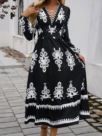 Ruffled Printed Plunge Long Sleeve Dress