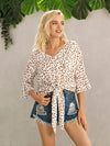 Blusa de cuello en V con botones y estampado atada