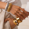 Brazalete de acero inoxidable chapado en oro de 18 quilates