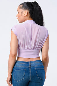 Blusa de lujo con cuello en V y contraste