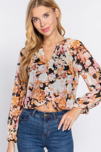 Blusa tejida con estampado y detalle de lazo frontal