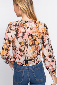 Blusa tejida con estampado y detalle de lazo frontal