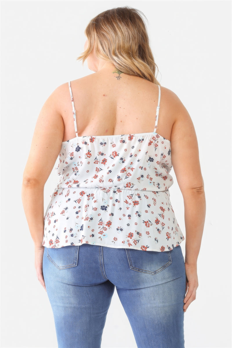 Top floral sin mangas con cuello cruzado y dobladillo acampanado