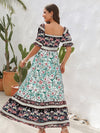 Vestido midi con mangas acampanadas de flores